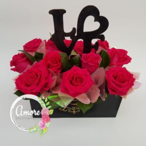 docena de rosas en caja love